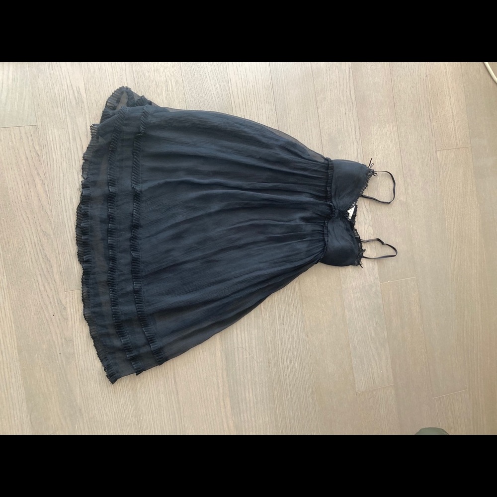 Feminine black silk dress.
